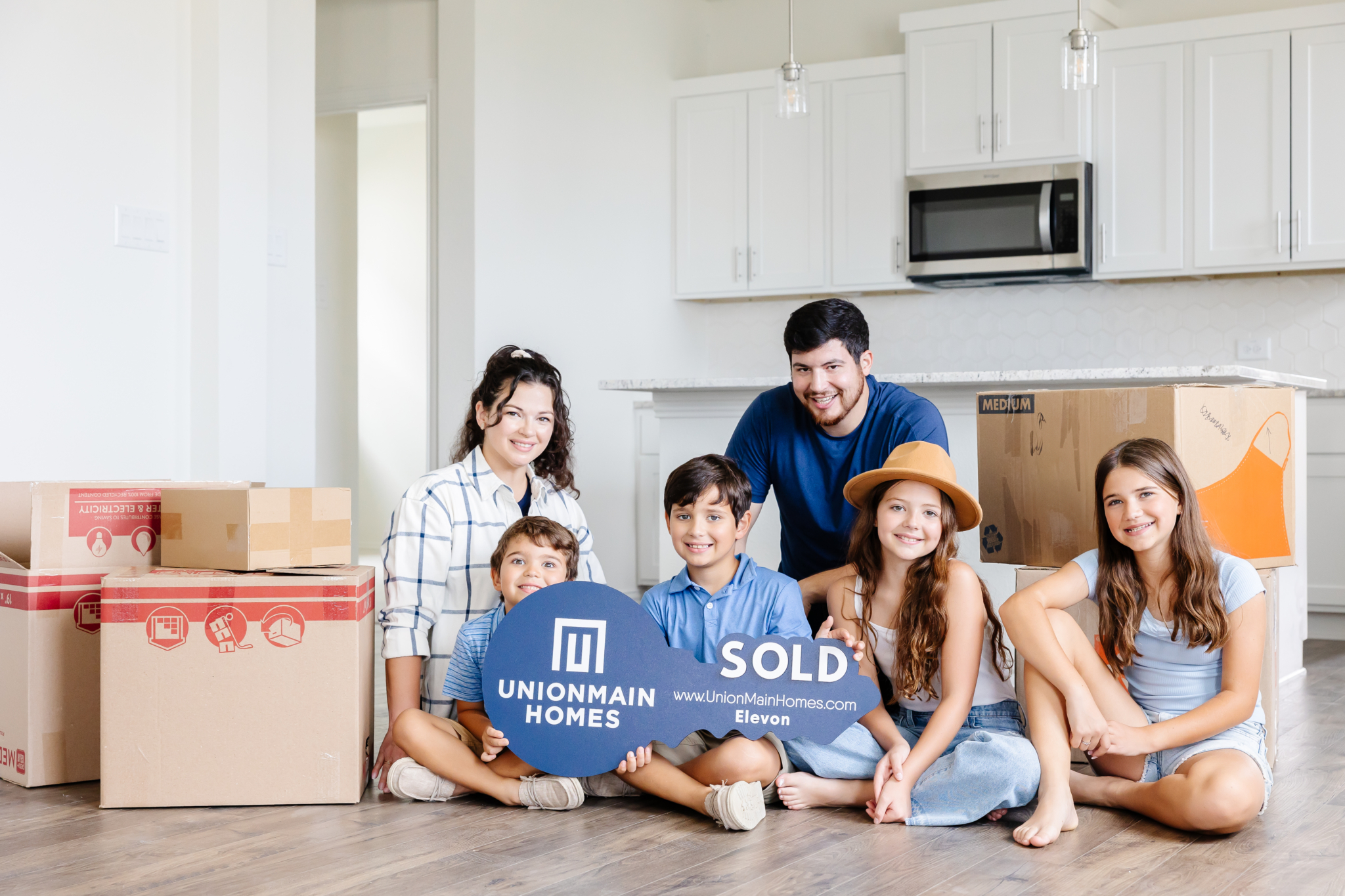 Family in their new home financed by UMH Mortgage in Texas